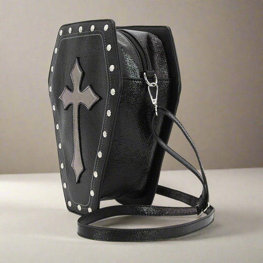 Studded vinyl convertible coffin bag with metallic cross