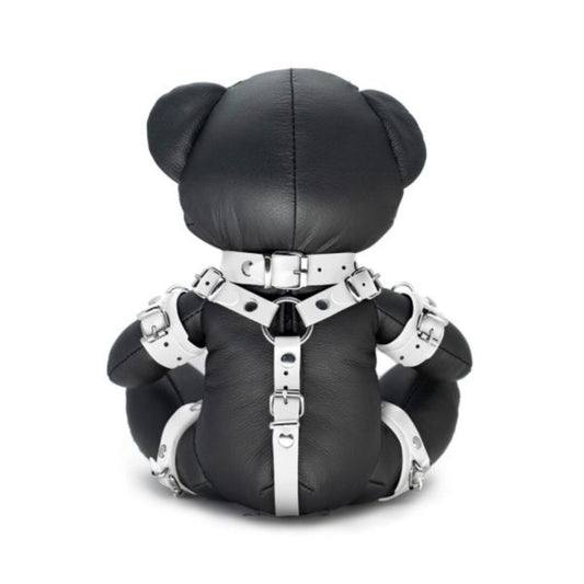 White bear bondage boy with harness, decorative 21-inch figure.



