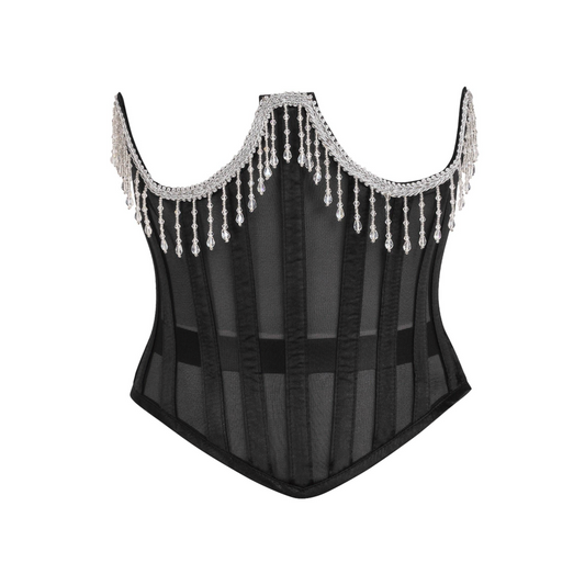 Sheer underbust corset with beaded fringe detailing, designed with 10 spiral steel bones for ultimate waist cinching. This corset features a side zipper closure for easy wear, along with 4 static back bones for extra support. The sheer fabric offers a sultry, transparent look, complemented by luxurious beaded fringe for added drama. Nickel brass grommets and thick cording allow for adjustable lace-up cinching, making this corset perfect for gothic, burlesque, or fetish looks. Equipped with garter loops for 