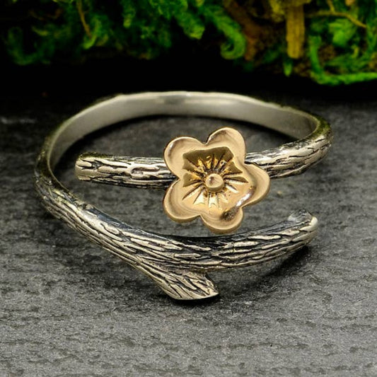 Sterling silver branch ring, bronze cherry blossom, adjustable mixed-metal jewelry.

