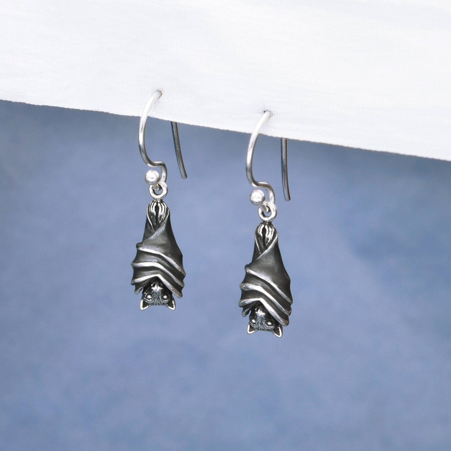 Sterling silver bat dangle earrings, ribbed wings, gothic jewelry, Halloween accessory.

