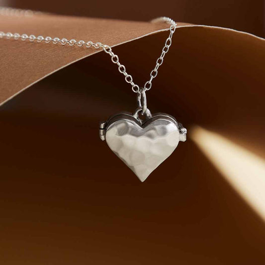 Sterling silver heart locket necklace, hammered finish, keepsake jewelry.